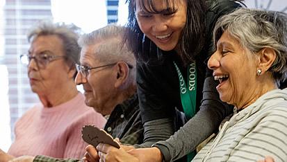 Residents laughing with staff